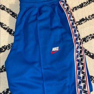 Blue Nike track pants